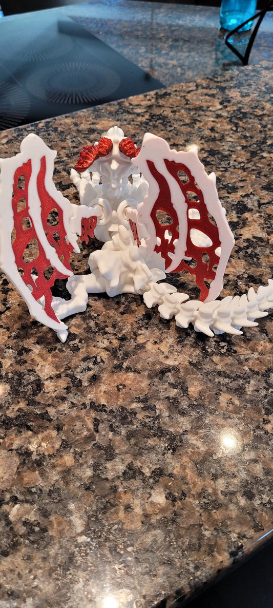 3D Printed Articulated Skeleton Dragon – Customizable Colors, White Body with Blue or Red Web Wings & Horns – Unique Fantasy Decor