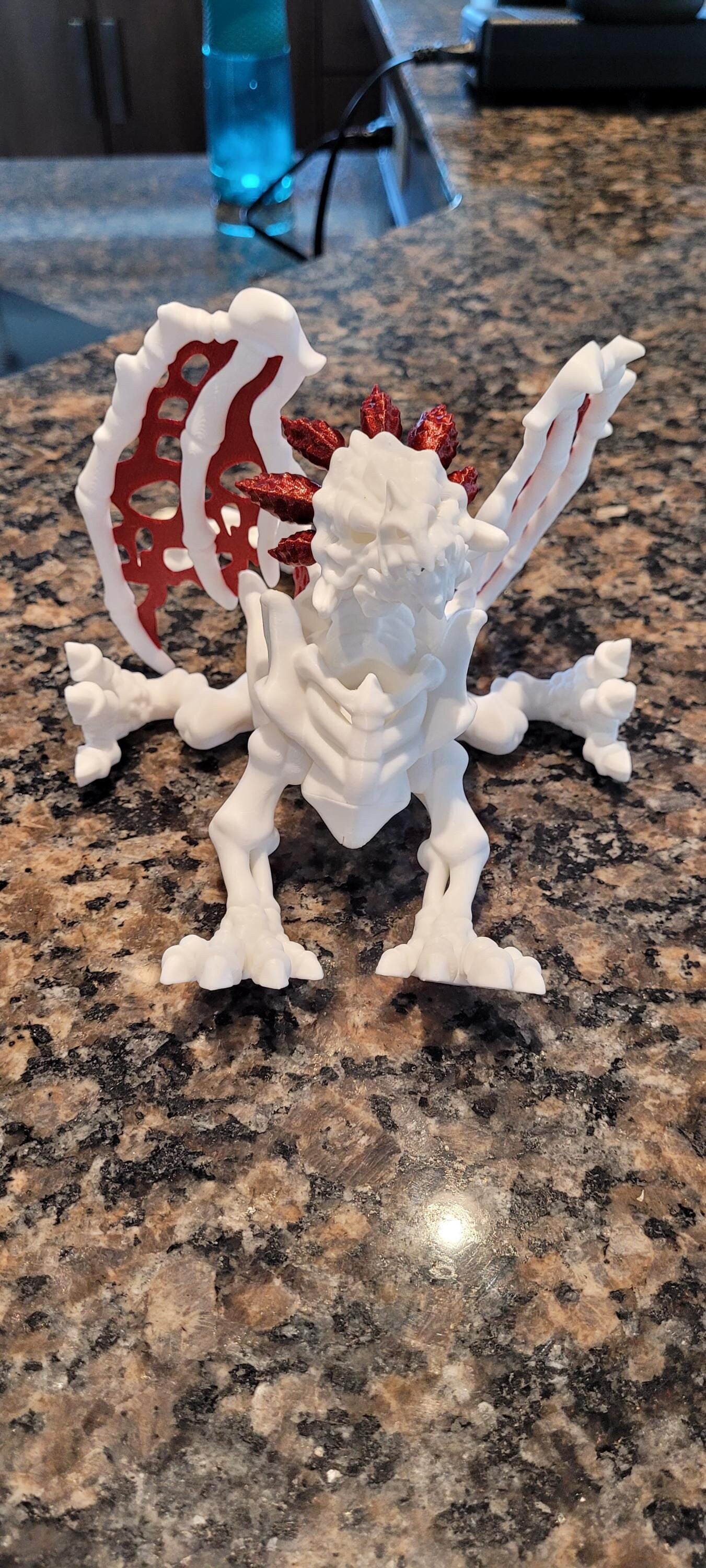 3D Printed Articulated Skeleton Dragon – Customizable Colors, White Body with Blue or Red Web Wings & Horns – Unique Fantasy Decor